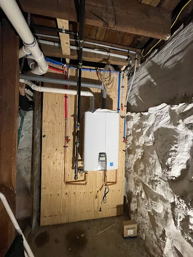 Navien tankless water heater plumbing and condensate connection installation