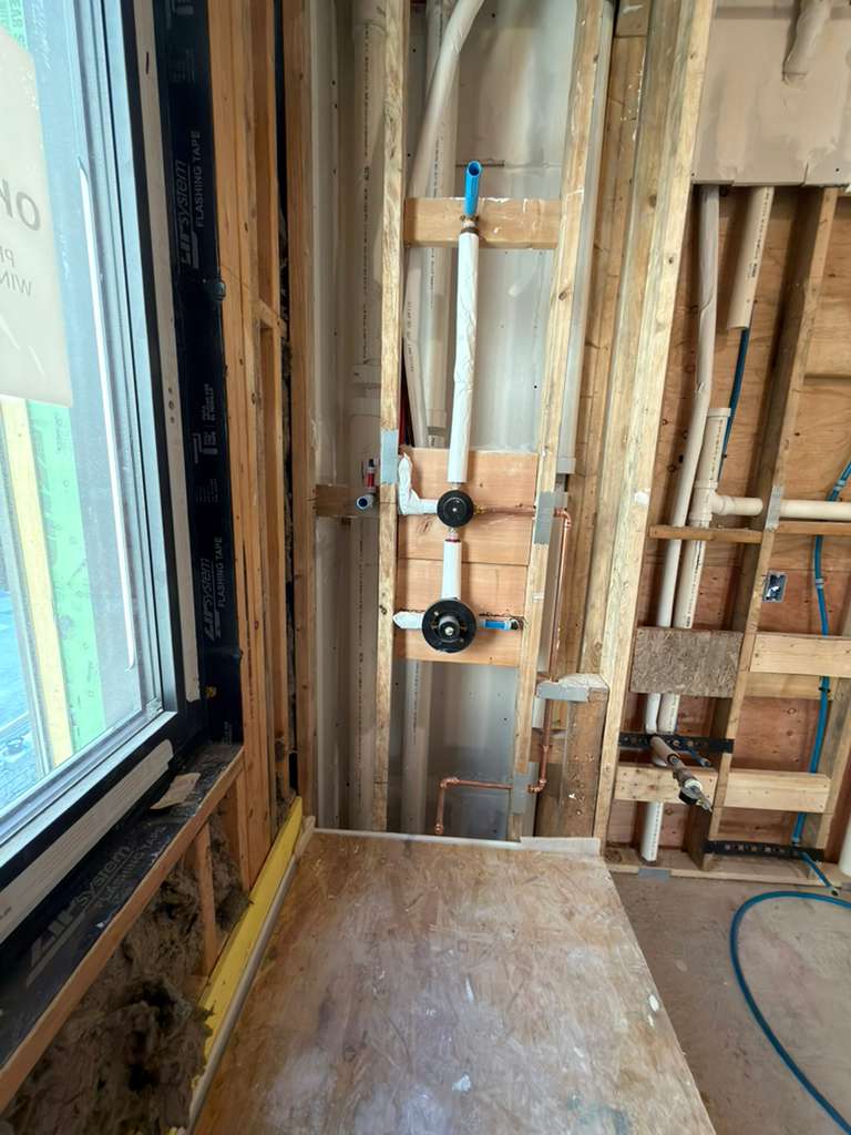 Plumbing for bathtub spout and shower valve in new bathroom installation