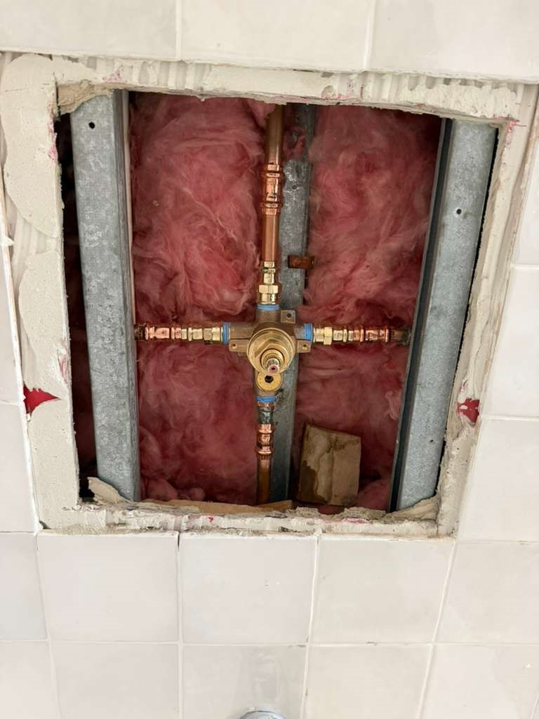 Bathroom plumbing valve replacement and rough pipe fitting