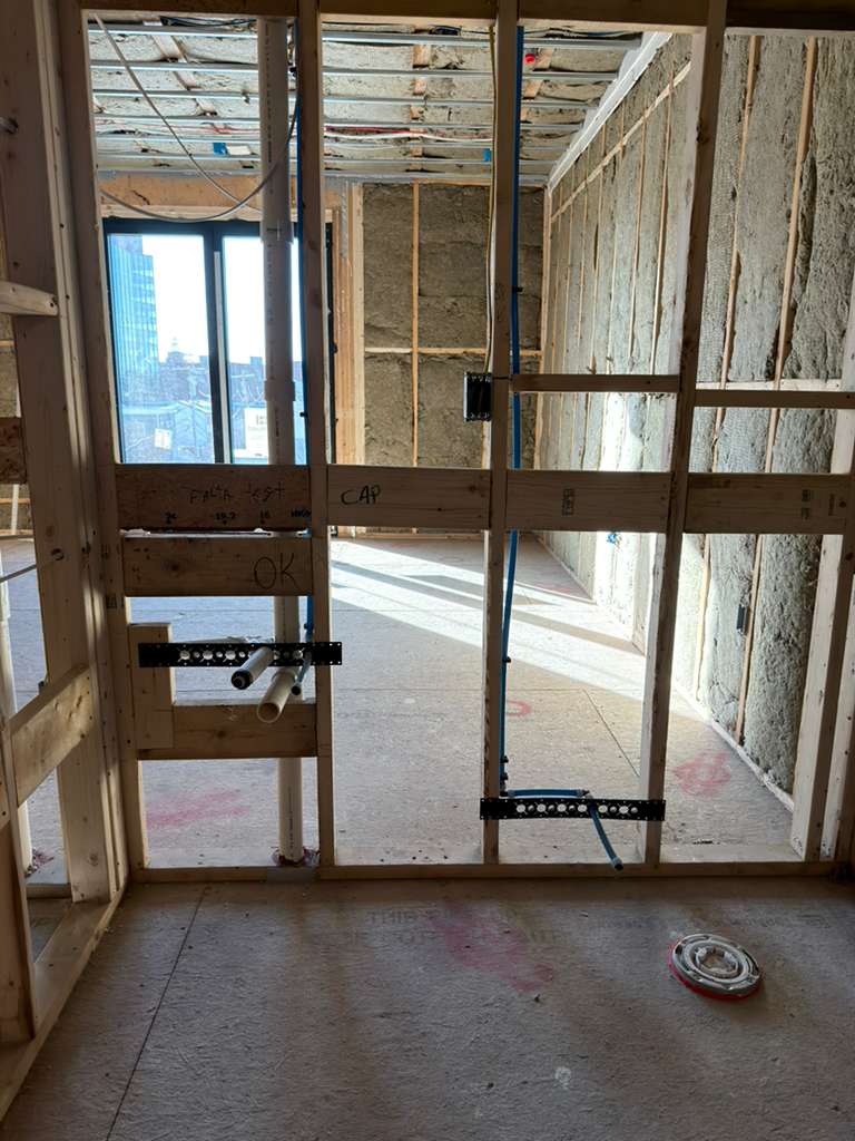 Bathroom sink and toilet rough plumbing installation